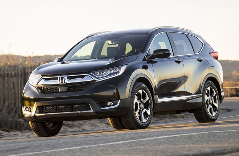 Driver side exterior view of a black Honda CR-V