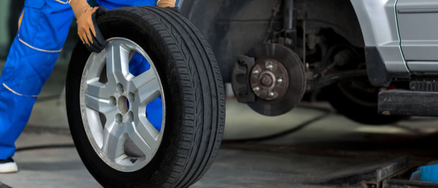 Man fixing tire