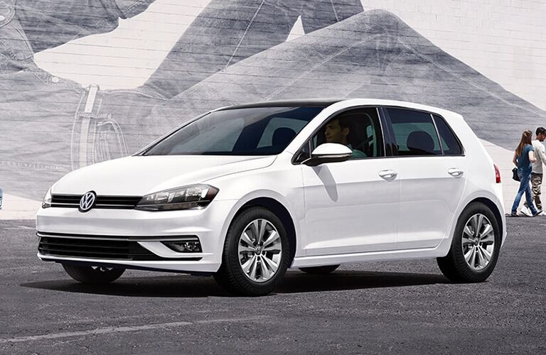 white 2019 Volkswagen Golf side view