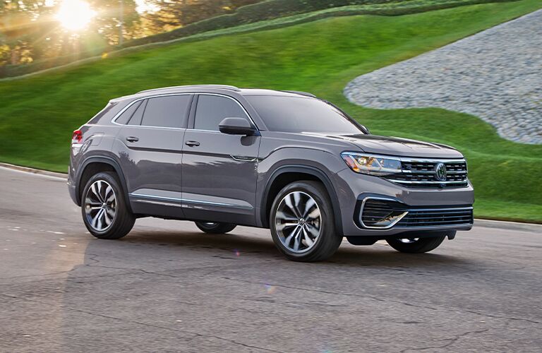 2021 VW Atlas Cross Sport driving through neighborhood