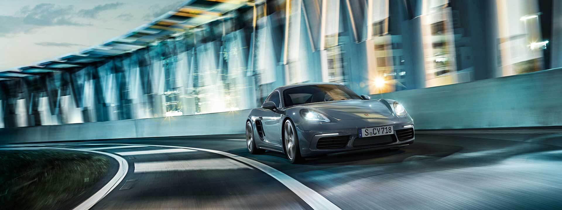 A Porsche driving in Oshkosh, WI