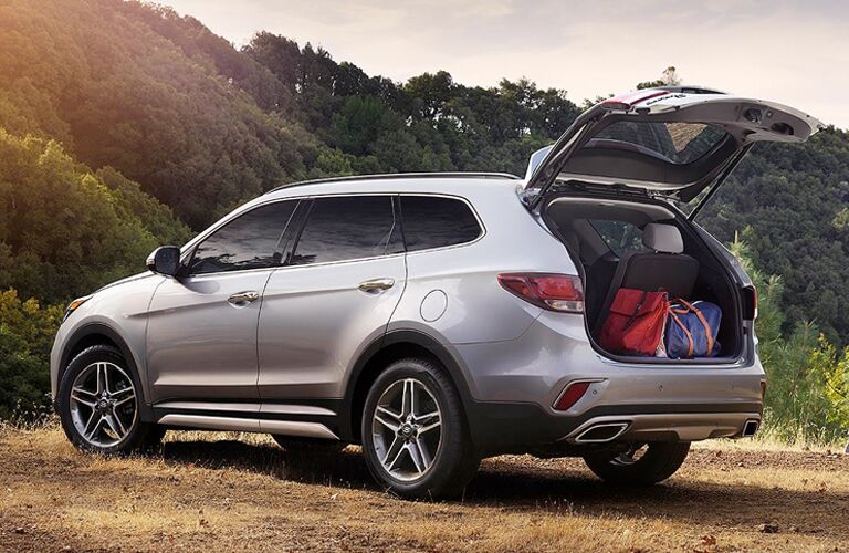 silver hyundai santa fe xl on mountain