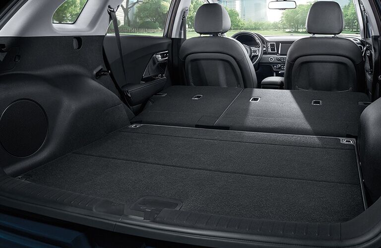 Rear seats folded down inside 2018 Kia Niro crossover