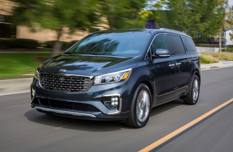 Exterior view of a blue 2020 Kia Sedona