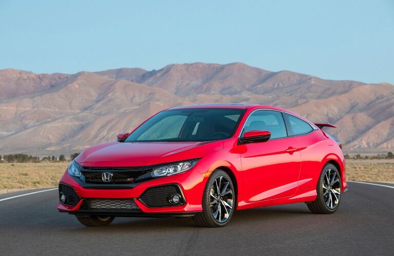 Red 2019 Honda Civic Si Coupe Front Exterior on a Desert Highway