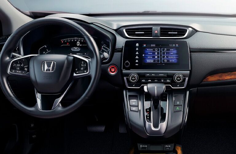2021 Honda CR-V interior shot of steering wheel, transmission, and dashboard layout