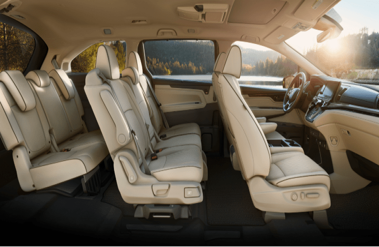 2021 Honda Odyssey interior side shot of 3-row seating upholstery and cabin space
