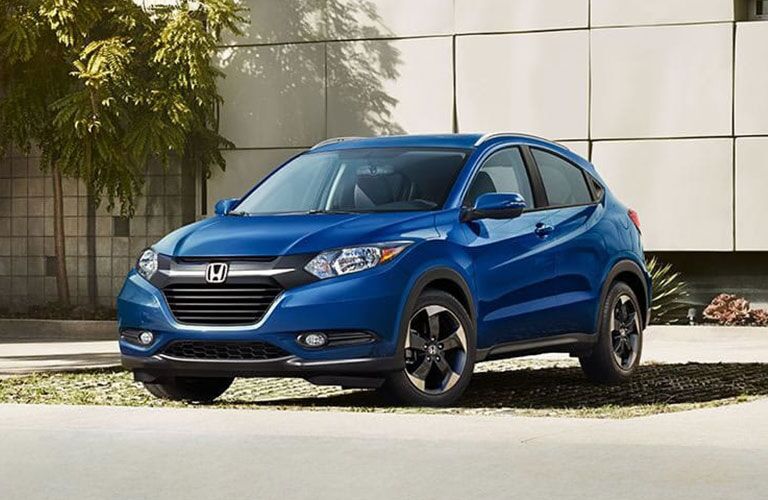 2018 Honda HR-V parked by a building and some palm trees