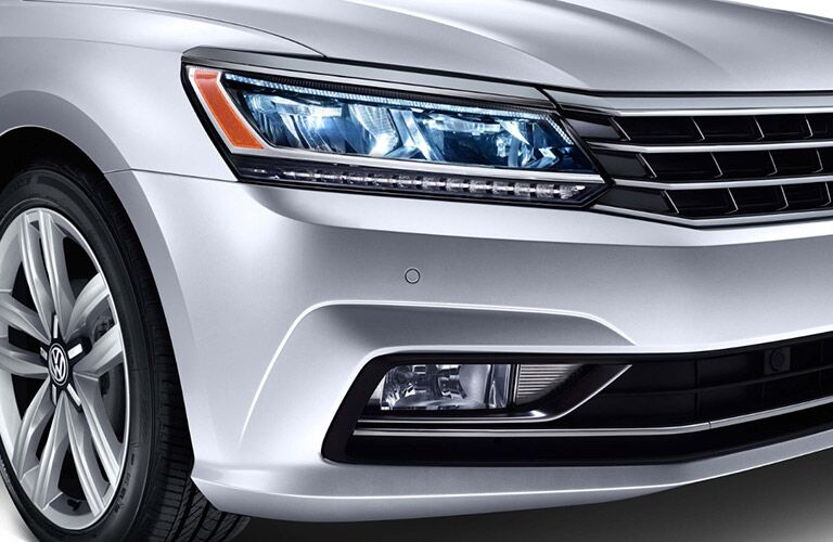 Headlights of a silver 2018 Volkswagen Passat