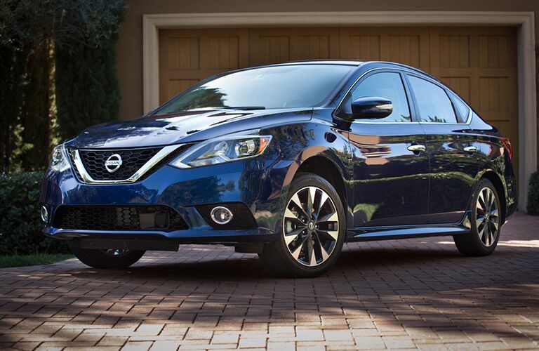 2018 Nissan Sentra parked by a house in a driveway