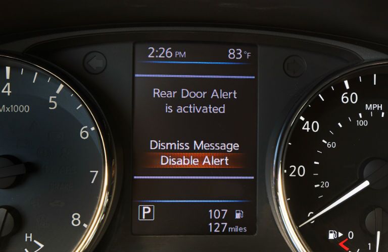 A photo of the Rear Door Alert message in the MID of the 2020 Nissan Rouge.