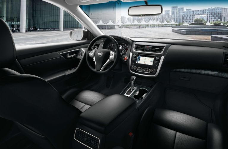 front interior of 2018 nissan altima including seats, dashboard and center infotainment system