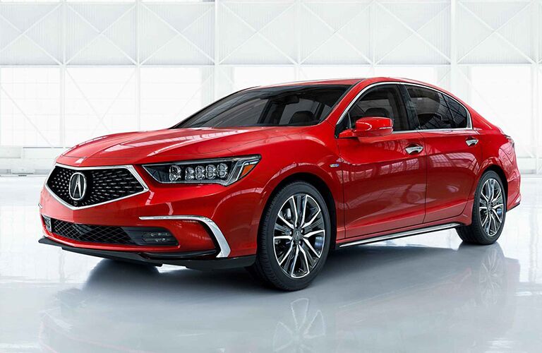 Red 2019 Acura RLX parked in white room