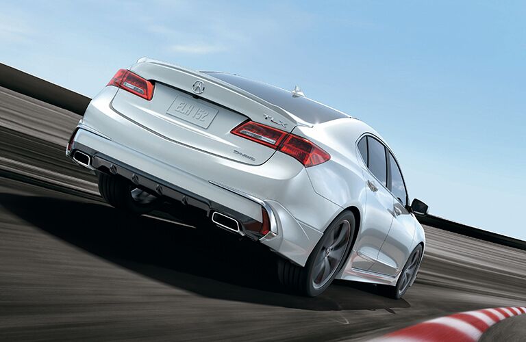 Passenger's side rear angle view of white 2020 Acura TLX