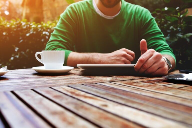 A man holding a tablet