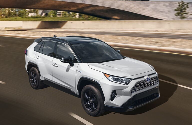 2019 Toyota RAV4 Hybrid driving on the highway