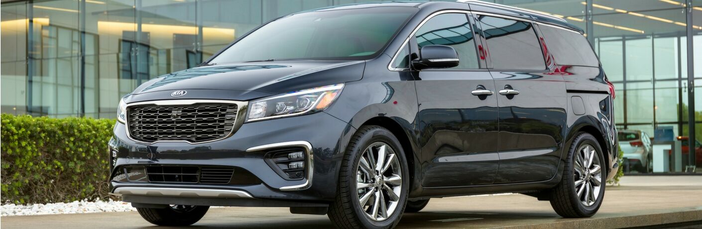 2019 Kia Sedona black sitting outside office