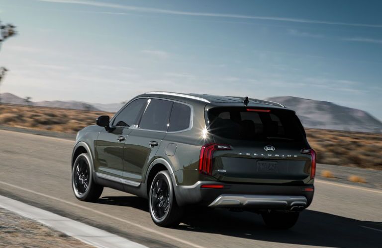 A rear left quarter photo of the 2020 Kia Telluride on the road.