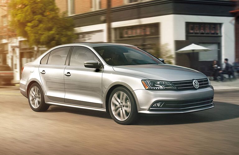 Silver 2015 Volkswagen Jetta exterior front/side angled view.