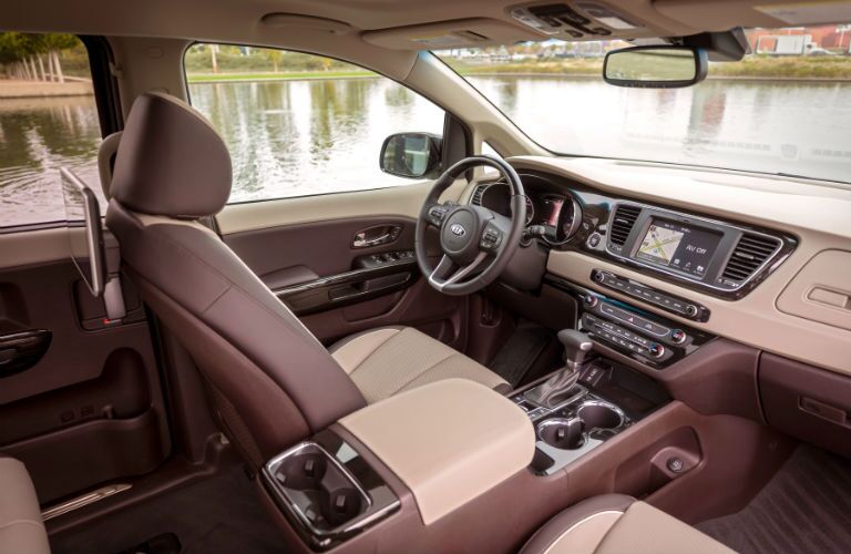 An interior photo of the driver's cockpit in the 2019 Kia Sedona.
