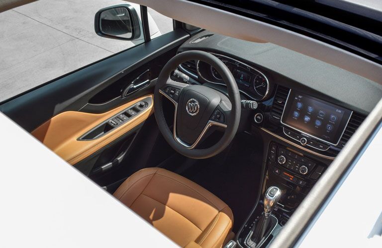 2019 Buick Encore overhead shot of front driver's seat and dashboard taken through the panoramic sunroof