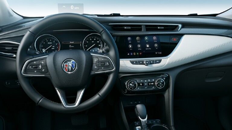 2020 Buick Encore GX interior shot of steering wheel, transmission, dashboard, and head-up display