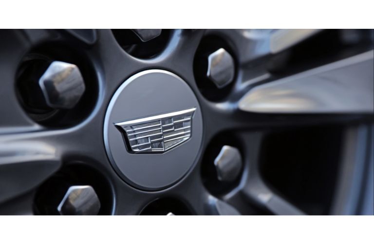 2020 Cadillac XT6 SUV exterior closeup of wheel design with brand logo imprint