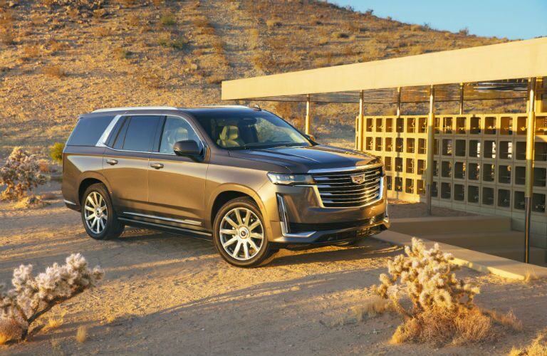 A photo of the 2021 Cadillac Escalade ESV parked in the desert.