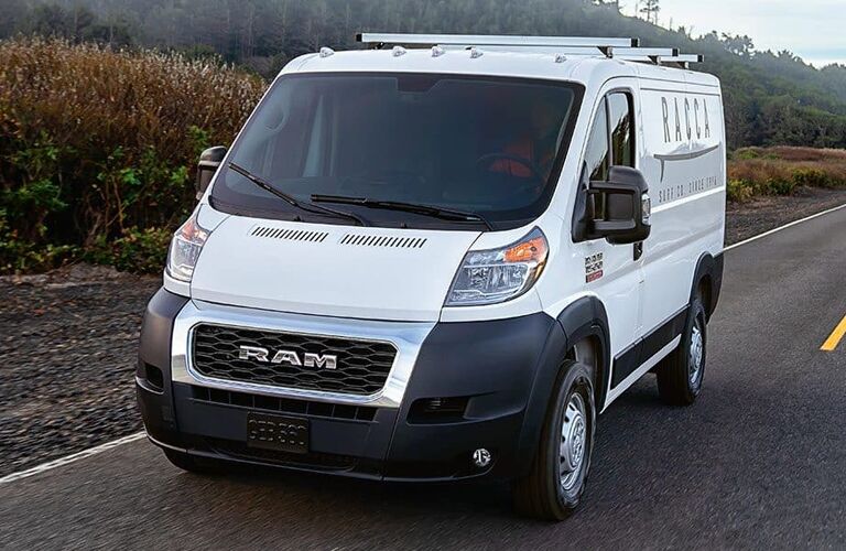 2019 Ram Promaster City exterior front shot with white paint color parked on a country road