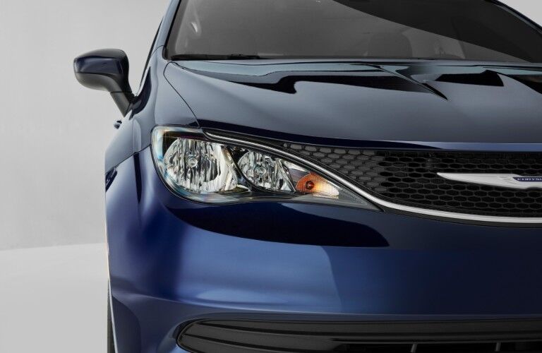 Headlight and front grille of 2020 Chrysler Voyager