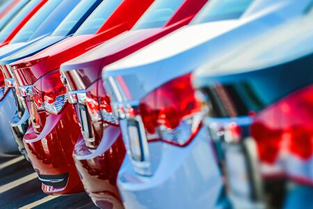 Image of used vehicles inside a dealership's showroom
