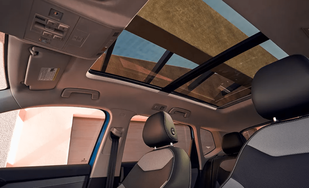 Interior shot of a VW shows the front seat.