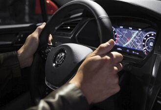 Leather-wrapped, multi-function heated steering wheel