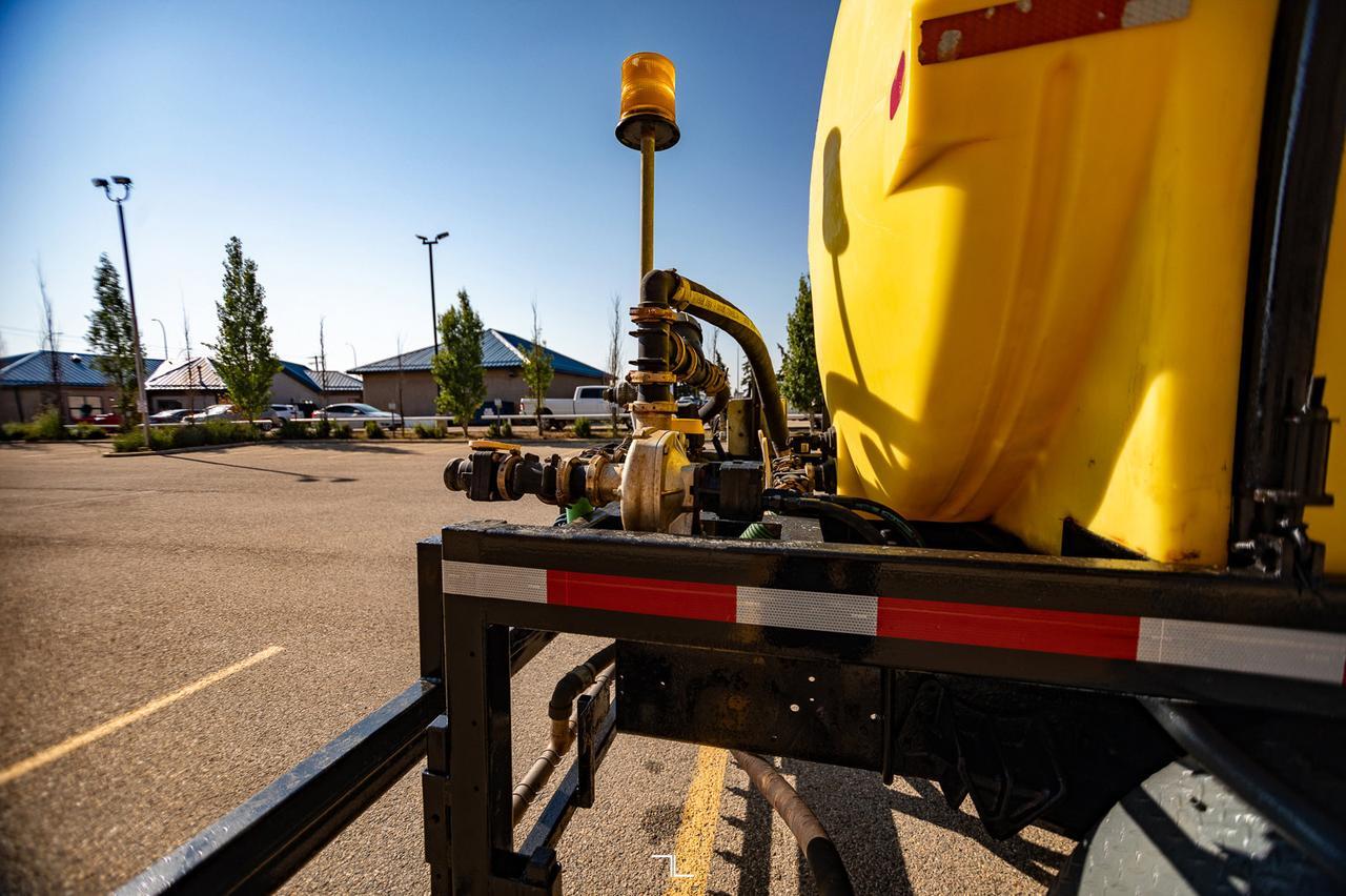 1990 International 4900 Day Cab Water Tank Truck Diesel Red Deer AB