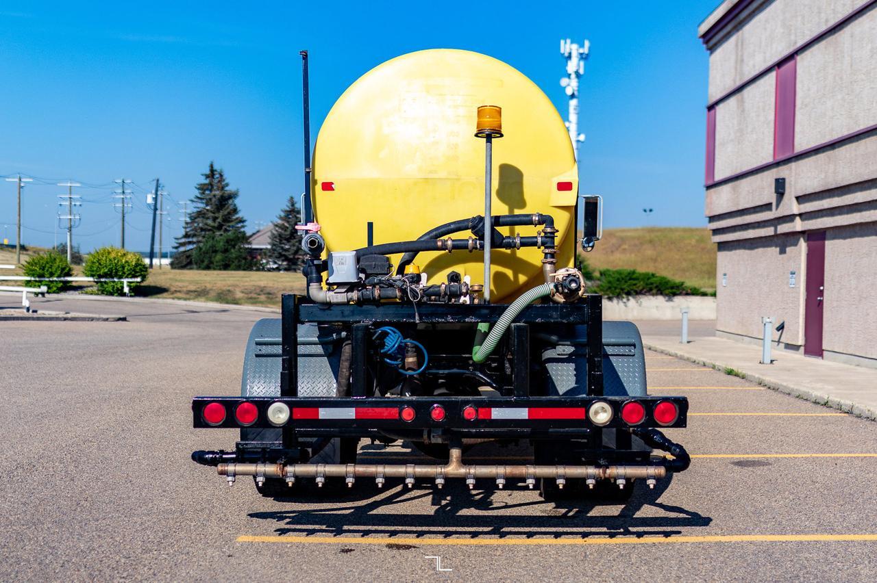 1990 International 4900 Day Cab Water Tank Truck Diesel Red Deer AB