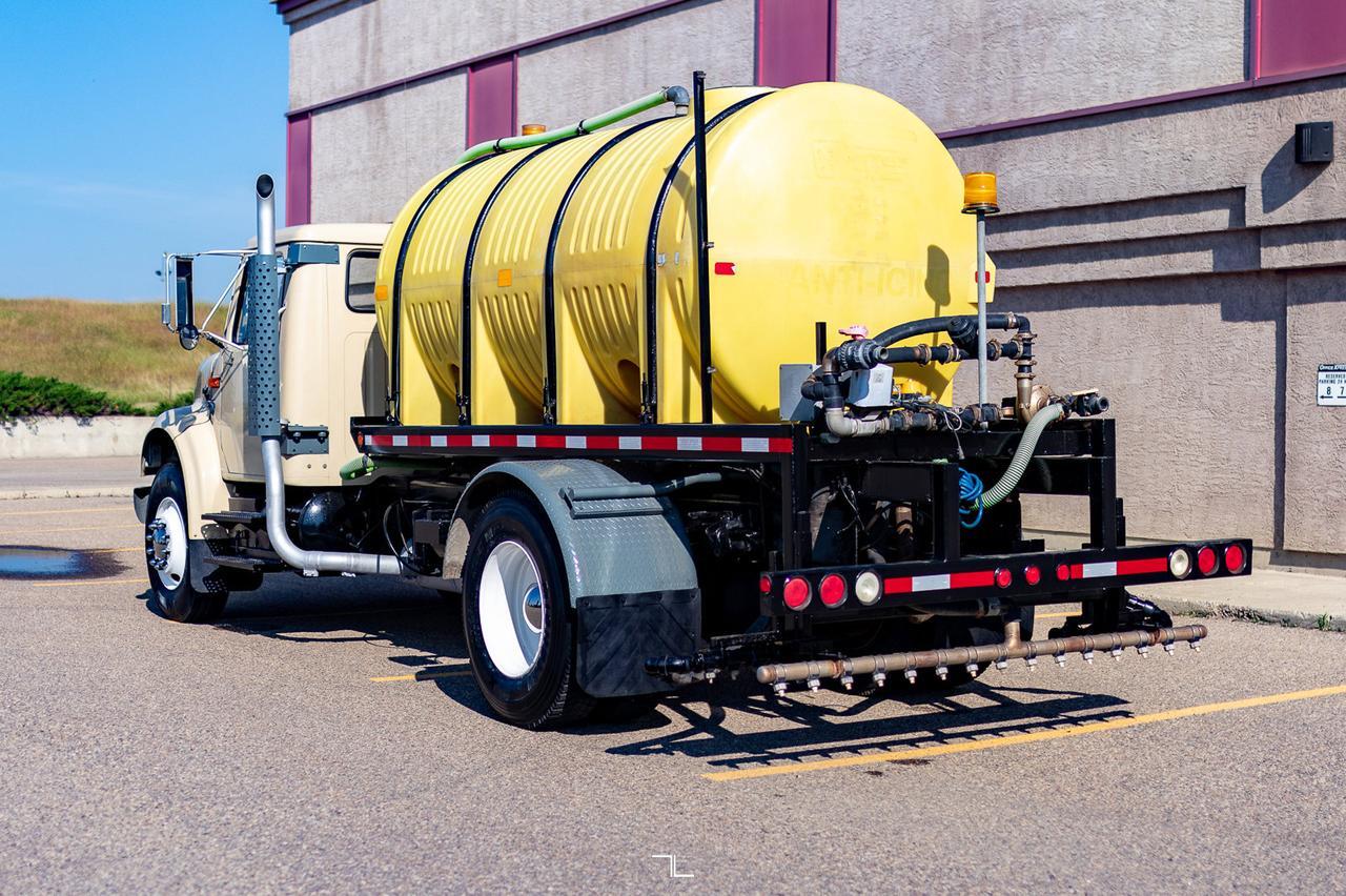 1990 International 4900 Day Cab Water Tank Truck Diesel Red Deer AB