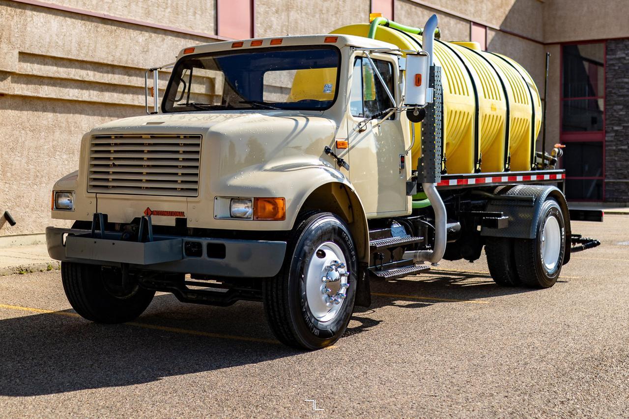 1990 International 4900 Day Cab Water Tank Truck Diesel Red Deer AB