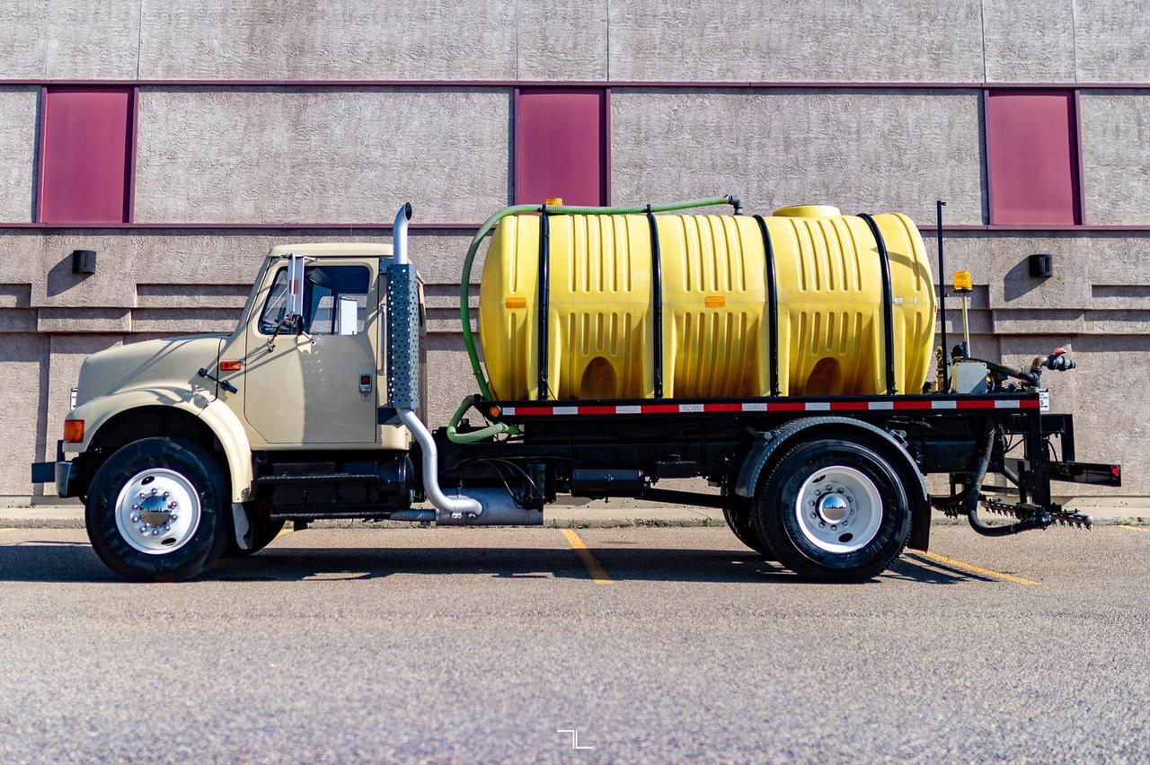 1990 International 4900 Day Cab Water Tank Truck Diesel Red Deer AB