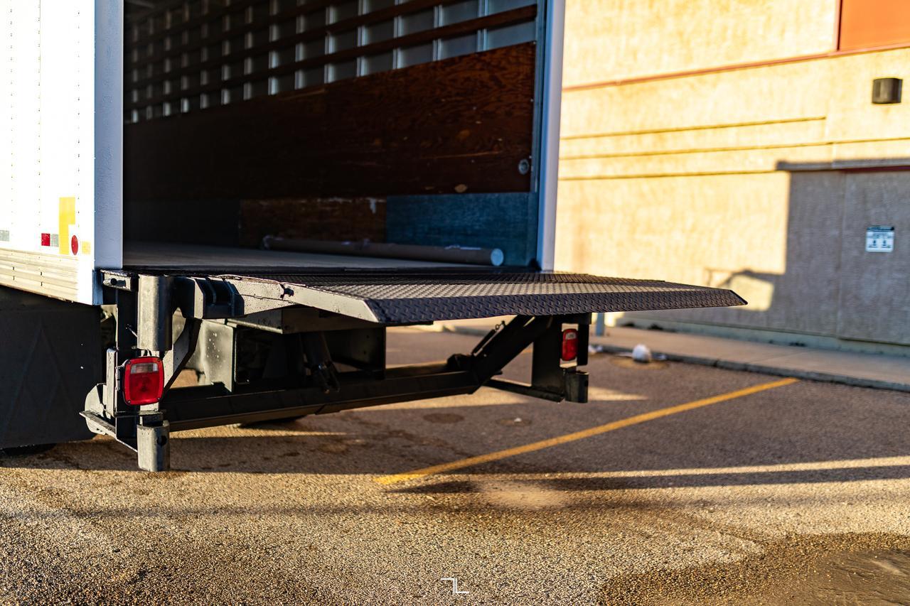 1993 Ford F-700 4x2 Reg Cab 22 Ft. Cube Van Manual Red Deer AB