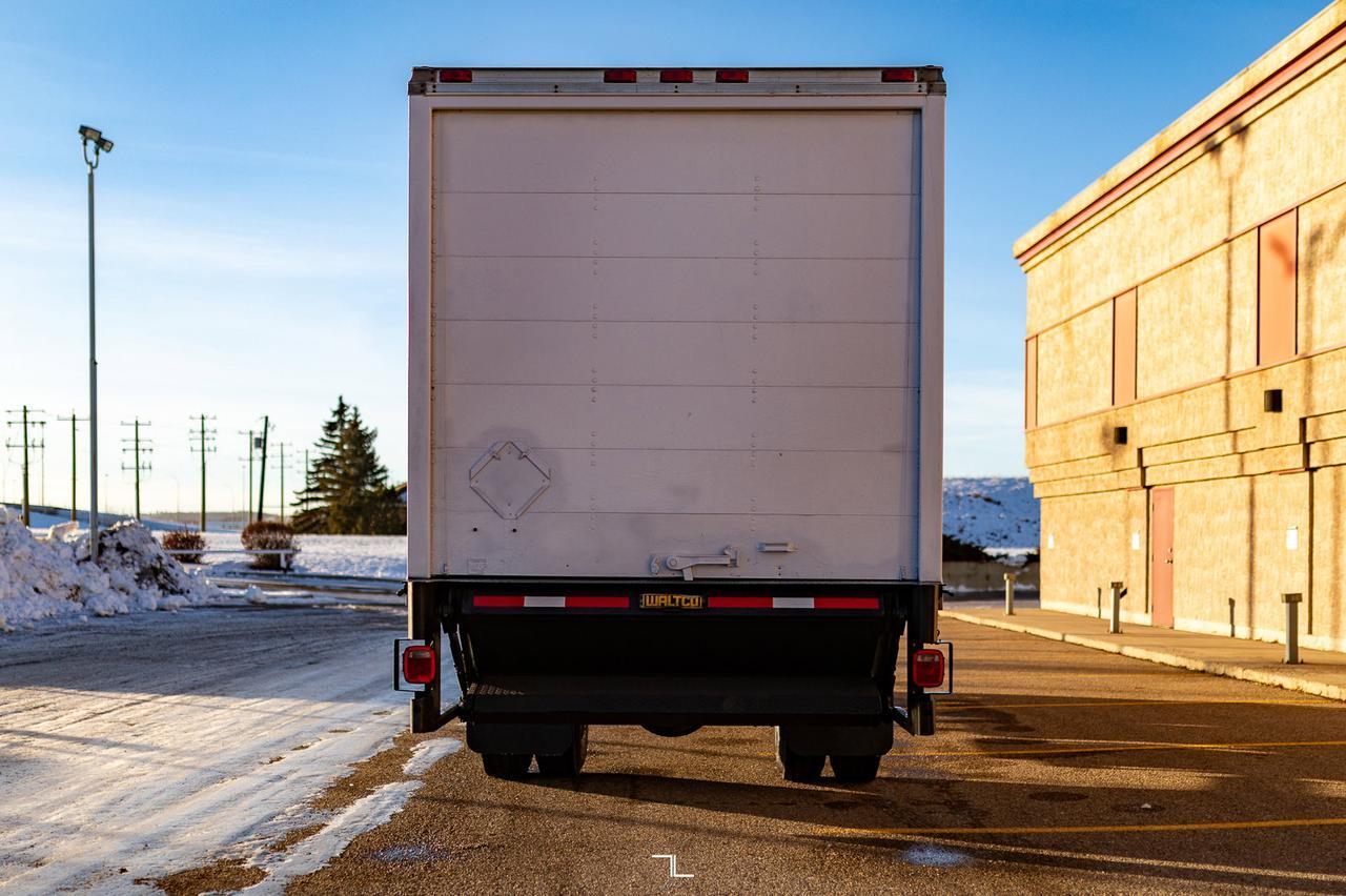 1993 Ford F-700 4x2 Reg Cab 22 Ft. Cube Van Manual Red Deer AB