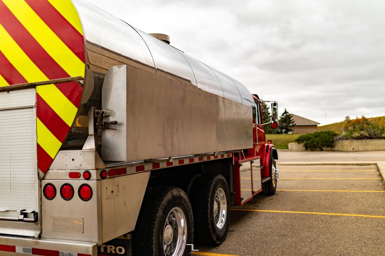 1997 Freightliner FL80 Water Tank Truck Diesel Red Deer AB