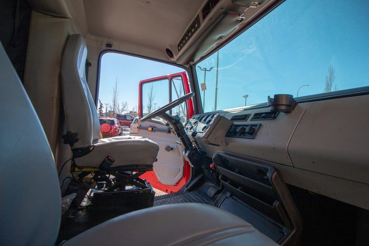 1998 FREIGHTLINER FL70 Coventional Cab Cummins Diesel Red Deer AB