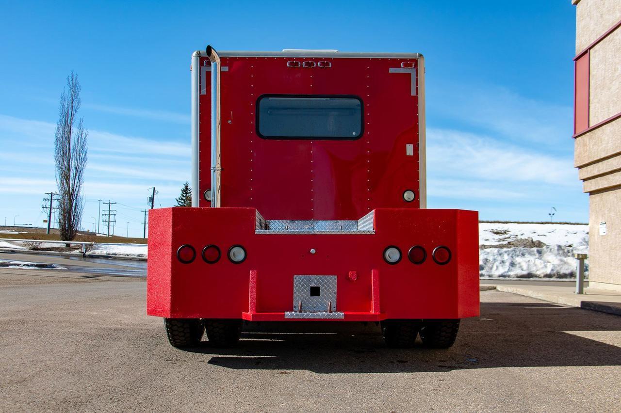 1998 FREIGHTLINER FL70 Coventional Cab Cummins Diesel Red Deer AB