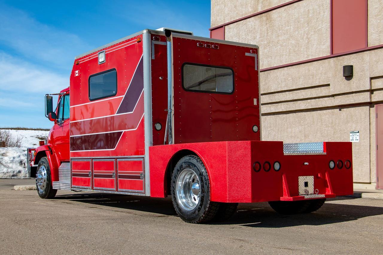 1998 FREIGHTLINER FL70 Coventional Cab Cummins Diesel Red Deer AB
