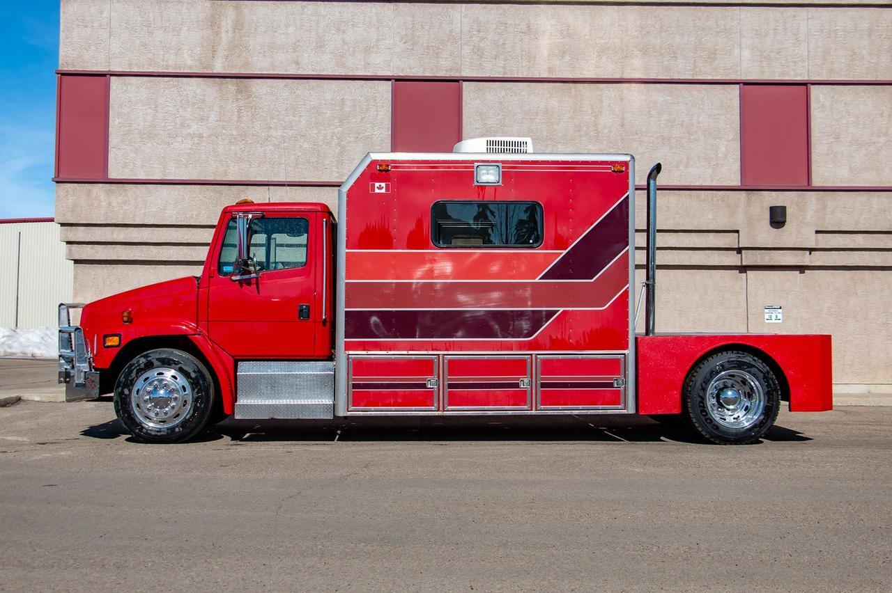 1998 FREIGHTLINER FL70 Coventional Cab Cummins Diesel Red Deer AB