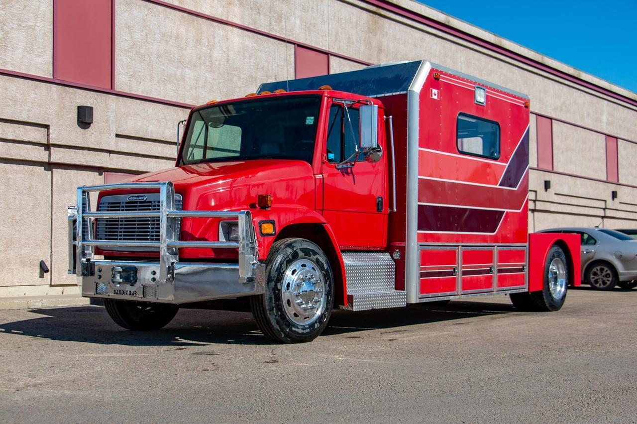 1998 FREIGHTLINER FL70 Coventional Cab Cummins Diesel Red Deer AB