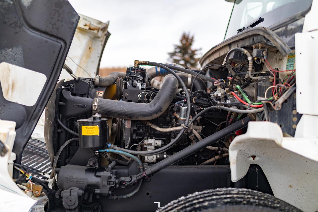 1998 Freightliner FL80 Daycab Dump Truck Diesel Auto Red Deer AB