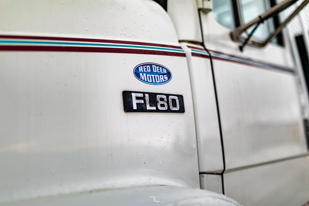 1998 Freightliner FL80 Daycab Dump Truck Diesel Auto Red Deer AB