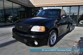 1999 Ford F-150 SVT Lightning / 5.4L Supercharged V8 / Regular Cab / Automatic / Power Driver's Seat / Power Locks, Windows & Mirrors / Air Conditioning / SnugTop Tonneau Cover / Second Set Of Rims / Tow Pkg / Only 38K Miles