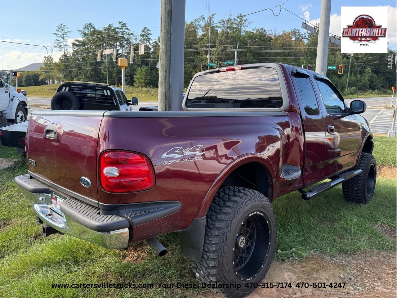 1999 Ford F150 XLT 4X4 - LIFTED  - LOW MILES